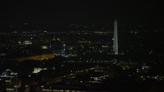 AX77_064 - 4.8K aerial stock footage of the White House and the Washington Monument, reveal Jefferson Memorial in Washington, D.C., night
