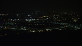 AX77_072 - 4.8K aerial stock footage of the Pentagon in Washington, D.C., at night