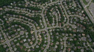 AX78_018E - 4.8K aerial stock footage of a bird's eye view of Union Mill Elementary School, suburban homes, Clifton, Virginia