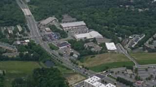 AX78_042E - 4.8K aerial stock footage of a shopping center by Frederick Avenue in Gaithersburg, Maryland