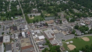 AX78_078 - 4.8K aerial stock footage of shops on Frederick Road in Catonsville, Maryland