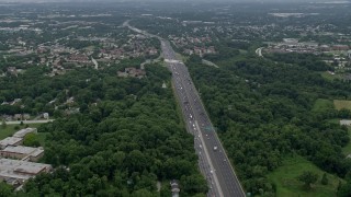 AX78_079 - 4.8K aerial stock footage of heavy traffic on Interstate 695 in Catonsville, Maryland