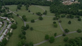 AX78_080 - 4.8K aerial stock footage of Baltimore National Cemetery in Catonsville, Maryland