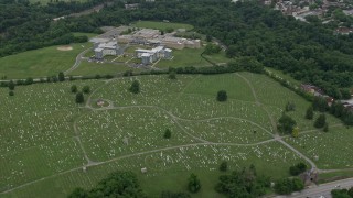 AX78_083 - 4.8K aerial stock footage of Mount Olivet Cemetery and The SEED School of Maryland in Baltimore