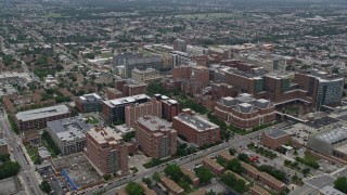 AX78_090E - 4.8K aerial stock footage of Johns Hopkins University School of Medicine, Baltimore, Maryland