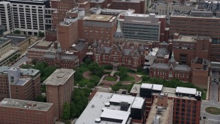 AX78_092 - 4.8K aerial stock footage of Johns Hopkins Hospital in Baltimore, Maryland