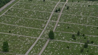 AX78_120 - 4.8K aerial stock footage of gravestones and green lawns at Baltimore Cemetery in Maryland