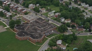 AX78_123 - 4.8K aerial stock footage of Furley Elementary School in Baltimore, Maryland