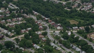 AX78_124 - 4.8K aerial stock footage of a suburban neighborhood in Baltimore, Maryland