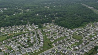 AX78_133E - 4.8K aerial stock footage flying over a suburban neighborhood in Perry Hall, Maryland