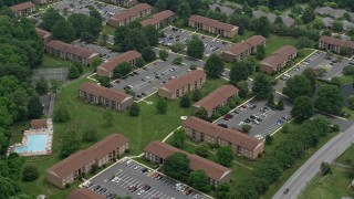 AX78_143 - 4.8K aerial stock footage of an apartment building complex in Abigdon, Maryland