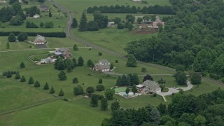 AX78_147E - 4.8K aerial stock footage of rural homes and a farm by Cullum Road in Abigdon, Maryland