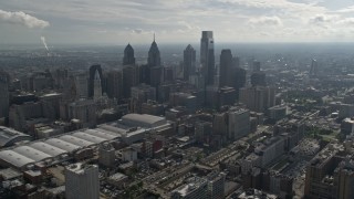 AX79_008E - 4.8K aerial stock footage of Pennsylvania Convention Center and skyscrapers, Downtown Philadelphia, Pennsylvania