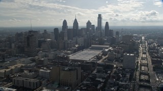AX79_024 - 4.8K aerial stock footage approaching the Philadelphia Convention Center and the Downtown Philadelphia skyline, Pennsylvania