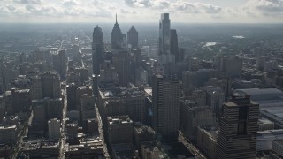 AX79_042 - 4.8K aerial stock footage of skyscrapers behind City Hall, seen from the convention center in Downtown Philadelphia, Pennsylvania