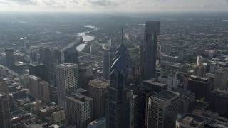 AX79_049 - 4.8K aerial stock footage flying over One and Two Liberty Place in Downtown Philadelphia, Pennsylvania