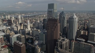 AX79_070E - 4.8K aerial stock footage of Philadelphia City Hall and tall Downtown Philadelphia towers, Pennsylvania