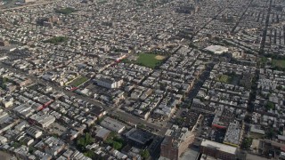 AX79_074 - 4.8K aerial stock footage of baseball field and urban homes, South Philadelphia, Pennsylvania