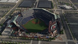 AX79_077E - 4.8K aerial stock footage tilting from I-76 to reveal Citizens Bank Park and parking lot, Philadelphia, Pennsylvania