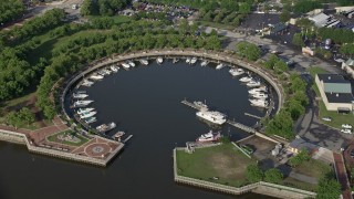 AX79_090 - 4.8K aerial stock footage of boats docked at Wiggins Marina, Camden, New Jersey