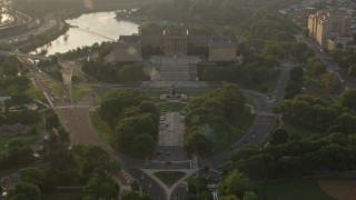 AX80_062E - 4.8K aerial stock footage approaching the fountain in The Oval park and Philadelphia Museum of Art, Pennsylvania Sunset