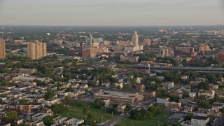 AX80_074 - 4.8K aerial stock footage of Camden County City Hall and US District Court, New Jersey, Sunset