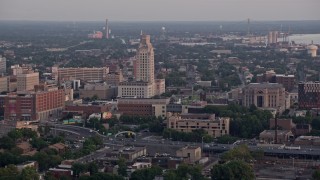 AX80_135 - 4.8K aerial stock footage of Camden County City Hall and US District Court in Camden, New Jersey, Sunset