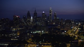AX81_010E - 4.8K aerial stock footage of Downtown Philadelphia skyline, Pennsylvania, Night