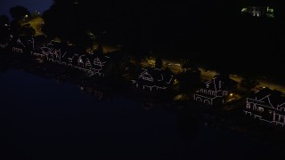 AX81_025E - 4.8K aerial stock footage of Boathouse Row lit up at night, Philadelphia, Pennsylvania