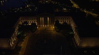 AX81_031E - 4.8K aerial stock footage orbiting Philadelphia Museum of Art and fountain, Pennsylvania, Night