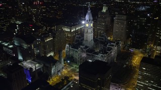 AX81_038E - 4.8K aerial stock footage approach and orbit Philadelphia City Hall in Downtown Philadelphia, Pennsylvania, Night