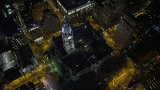 AX81_055 - 4.8K stock footage aerial video of a bird's eye view of Philadelphia City Hall, Pennsylvania, Night