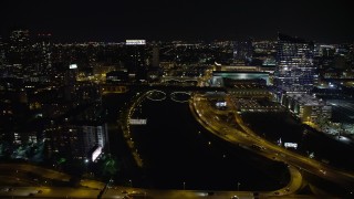 AX81_075 - 4.8K aerial stock footage flying over small bridges spanning Schuylkill River in Philadelphia, Pennsylvania, Night