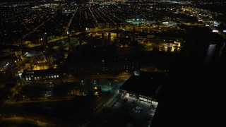 AX81_078 - 4.8K aerial stock footage of Veolia Energy power plant in South Philadelphia, Pennsylvania, Night