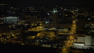 AX81_088 - 4.8K aerial stock footage of Camden County City Hall, New Jersey Night