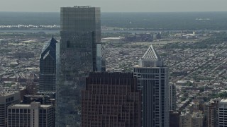 AX82_010 - 4.8K aerial stock footage of rooftops of Downtown Philadelphia's tallest skyscrapers, Pennsylvania