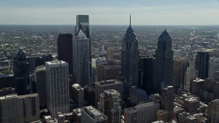 AX82_012E - 4.8K aerial stock footage of Downtown Philadelphia giants skyscrapers and city buildings, Pennsylvania