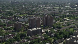 AX82_022 - 4.8K aerial stock footage of apartment buildings in an urban neighborhood, North Philadelphia, Pennsylvania