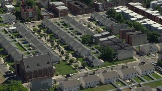 AX82_023 - 4.8K aerial stock footage of neighborhood with town houses, North Philadelphia, Pennsylvania