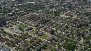 AX82_024 - 4.8K aerial stock footage of apartment buildings and urban homes in North Philadelphia, Pennsylvania