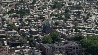 AX82_026 - 4.8K aerial stock footage of St. Laurentius Parish church in an urban neighborhood, North Philadelphia, Pennsylvania