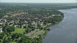 AX82_037 - 4.8K aerial stock footage of apartment buildings and homes beside the Delaware River, Philadelphia, Pennsylvania