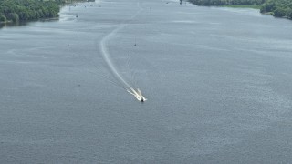 AX82_039 - 4.8K aerial stock footage of fishing boat on the Delaware River, Philadelphia, Pennsylvania
