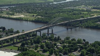 AX82_051 - 4.8K aerial stock footage flying by the Delaware River Bridge, Bristol, Pennsylvania
