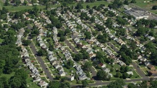 AX82_052 - 4.8K aerial stock footage of the suburban neighborhood in Levitown, Pennsylvania