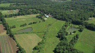 AX82_085 - 4.8K aerial stock footage of a farm and farmland in Lawrenceville, New Jersey