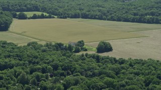 AX82_087 - 4.8K aerial stock footage of farmhouse and farm fields in Lawrenceville, New Jersey