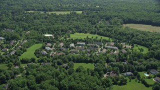 AX82_088 - 4.8K aerial stock footage approaching spacious mansions in Princeton, New Jersey