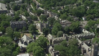 AX82_097 - 4.8K aerial stock footage flying by Mathey College at Princeton University, New Jersey