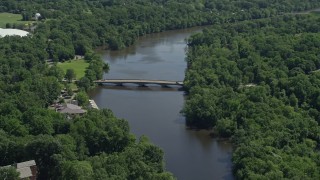 AX82_101 - 4.8K aerial stock footage of Shea Rowing Center by Lake Carnegie at Princeton University, New Jersey